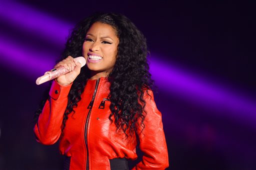 In this June 7, 2015 file photo, Nicki Minaj performs at the 2015 Hot 97 Summer Jam at MetLife Stadium, in East Rutherford, New Jersey. Taylor Swift and Minaj traded words on Twitter after the rapper said she was upset she didnt earn a nomination for video of the year at the MTV Video Music Awards. Minaj tweeted multiple times that she didnt understand why her rump-shaking video for Anaconda wasnt up for the top award when MTV announced the nominees Tuesday, July 21, 2015. (Photo by Scott Roth/Invision/AP, File)