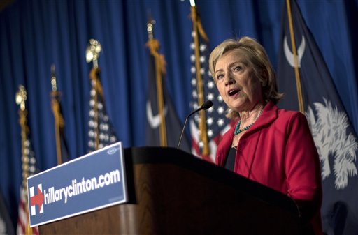 In this July 23, 2015, photo, Democratic presidential hopeful Hillary Rodham Clinton speaks at a campaign event in Columbia, S.C. In her second pass at the presidency, Clinton has made discussing systemic racism a hallmark of her campaign as she looks to connect with the black voters who helped propel President Barack Obama to the White House. At multiple campaign stops, she bemoaned "mass incarceration," an uneven economy, increasingly segregated public schools, and poisoned relationships between police and the black community. She praised South Carolina leaders, including Republican Gov. Nikki Haley, for removing the Confederate battle from statehouse grounds after a white gunmans June massacre of nine churchgoers at a historic black congregation in Charleston. But she warned that the act is symbolic. (AP Photo/Stephen B. Morton)