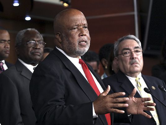 Rep. Bennie Thompson, D-Miss., speaks to reporters as Rep. Jim Clyburn, D-S.C., left, and Rep. G.K. Butterfield, D-N.C., listen, regarding a resolution to remove the confederate flag at Park Service-run cemeteries on Thursday, July 9, 2015 on Capitol Hill in Washington. (Lauren Victoria Burke/AP Photo)