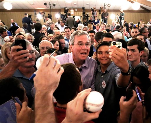 2016 Republican presidential candidate Jeb Bush greets supporters  during a campaign rally at the Maitland Venue in Maitland, Fla., Monday, July 27, 2015. (Joe Burbank/Orlando Sentinel via AP)