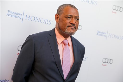 FILE - In this May 27, 2015 file photo, Laurence Fishburne arrives at the 2015 Television Academy Honors at The Montage Hotelin Beverly Hills, Calif. Fishburne will star as Alex Haley in the  A+E Networks scripted event series, "Roots." (Photo by Rich Fury/Invision/AP, File)