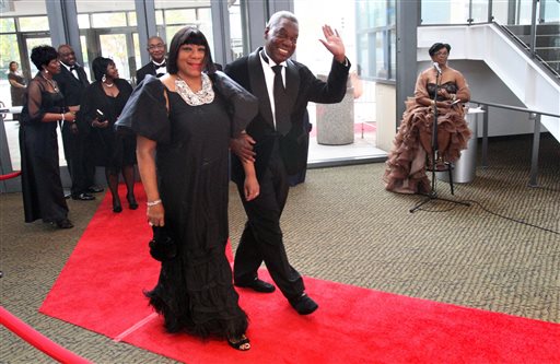 This Nov. 12, 2011, photo shows Adrienne Bailey and her husband Judge D'Army Bailey, civil rights activist and a founder of the National Civil Rights Museum, walk on the red carpet as they arrive with other dignitaries and guests to the 2011 Freedom Awards at the Cannon Center for the Performing Arts in Memphis, Tenn. Bailey, a lawyer and judge who helped preserve the Memphis hotel where civil rights leader Martin Luther King Jr. was assassinated and turn it into National Civil Rights Museum, died on Sunday, July 12, 2015, his wife said. He was 73.  (Mike Maple/The Commercial Appeal via AP)