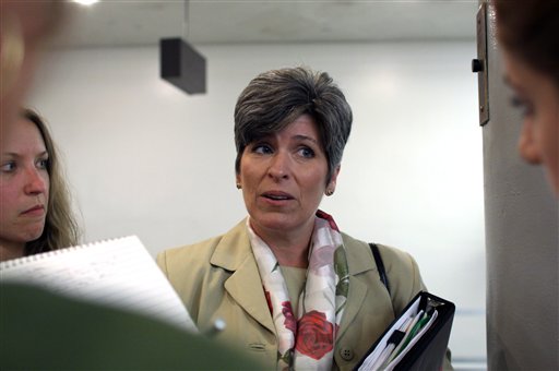 Sen. Joni Ernst, R-Iowa, speaks to reporters about Planned Parenthood on Monday, Aug. 3, 2015 on Capitol Hill in Washington. The Senate blocked a Republican drive Monday to terminate federal funds for Planned Parenthood, setting the stage for the GOP to try again this fall amid higher stakes (AP Photo/Lauren Victoria Burke)