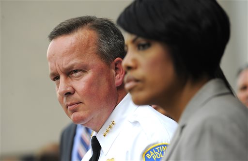 Acting Police Commissioner Kevin Davis announces the start of the Baltimore Federal Homicide Task Force, Monday, Aug. 3, 2015, in Baltimore. Baltimore police and civic leaders launched a partnership Monday with five federal agencies that will embed their special agents with city homicide detectives, bidding to quell an upswing in homicides and other violent crime in that city. (Lloyd Fox/The Baltimore Sun via AP)
