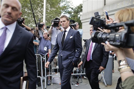 New England Patriots quarterback Tom Brady leaves federal court Wednesday, Aug. 12, 2015, in New York. Brady left the courthouse after a full day of talks with a federal judge in his dispute with the NFL over a four-game suspension. (AP Photo/Frank Franklin II)