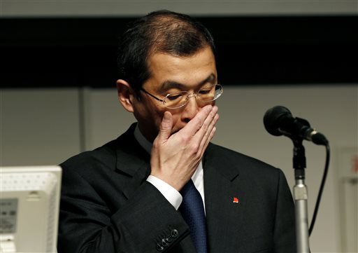 In this Thursday, June 25, 2015, file photo, Japanese seat belt and air-bag maker Takata Corp. Chairman and CEO Shigehisa Takada gestures during a news conference regarding the expanding recall of his company's air bags in Tokyo. The 2015 American Consumer Satisfaction Index found that satisfaction with automobiles dropped for the third straight year to the lowest level since 2004. Last year automakers recalled a record 64 million vehicles for problems such as exploding air bags, including Takata air bags. (AP Photo/Shuji Kajiyama, File)