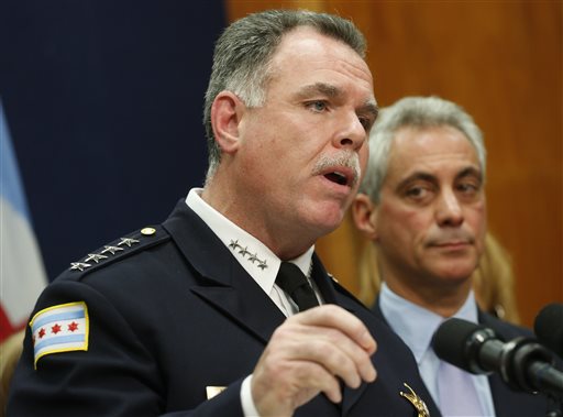 In this Oct. 15, 2013 file photo Chicago Police Superintendent Garry McCarthy, left, speaks at a news conference in Chicago. The Chicago Police Department will allow independent evaluations of its stop-and-frisk procedures that critics have said targeted blacks under an agreement announced Friday, Aug. 7, 2015 with the American Civil Liberties Union, an agreement that comes as police departments across the United States are under intense scrutiny about the way they treat minorities. (AP Photo/M. Spencer Green, File)