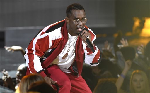 In this Sunday, June 28, 2015 file photo, Sean "Diddy" Combs performs at the BET Awards at the Microsoft Theater in Los Angeles. A spokesman for the Los Angeles City Attorney's Office said on Wednesday, Sept. 9, 2015, that an Oct. 15, 2015 hearing, known as an informal conference, has been set to determine whether Combs will face any penalties, ranging from restitution payments and counseling to a possible misdemeanor charge, over a June incident in which police say he wielded a kettlebell at the University of California, Los Angeles.  (Photo by Chris Pizzello/Invision/AP, File)