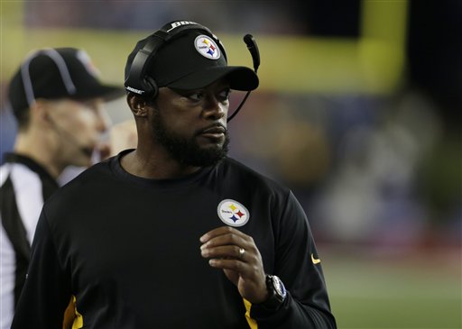 Pittsburgh Steelers head coach Mike Tomlin watches from the sideline in the first half of an NFL football game against the New England Patriots, Thursday, Sept. 10, 2015, in Foxborough, Mass. (AP Photo/Charles Krupa)