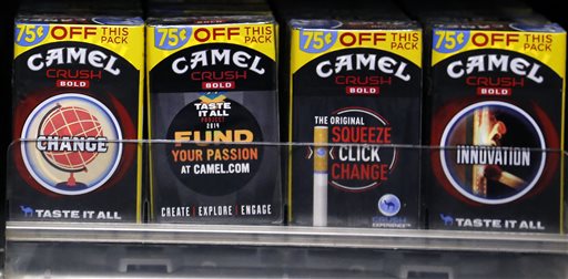 In this Friday, July 17, 2015 photo, Camel Crush Bold cigarettes, a R.J. Reynolds Tobacco Co. brand, are on display at a Smoker Friendly shop in Pittsburgh. The Food and Drug Administration on Tuesday, Sept. 15, 2015 banned sales of Camel Crush Bold and three other cigarette brands from R.J. Reynolds because they did not meet the agencys safety review requirements. (AP Photo/Gene J. Puskar)