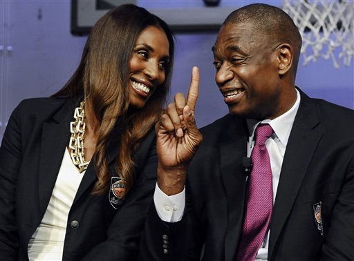 2015 class of inductees into the Basketball Hall of Fame Lisa Leslie, left, smiles as Dikembe Mutombo, right, waves his finger during a news conference at the Naismith Memorial Basketball Hall of Fame,Thursday, Sept. 10, 2015, in Springfield, Mass. (AP Photo/Jessica Hill)