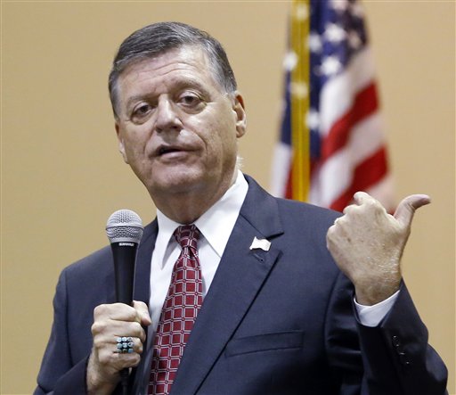  In this Aug. 18, 2015, photo, Rep. Tom Cole, R-Okla., gestures as he speaks during a town hall meeting in Moore, Okla. Congress returns on Sept. 8 with a critical need for a characteristic that has been rare through a contentious spring and summer _ cooperation between Republicans and President Barack Obama. "Its going to take a sense of give and take on both sides," said Cole. ":The big deal will be, Can you come to a deal on transportation, debt ceiling and avoiding sequester? So a large budget deal will determine, I think, whether or not weve really been successful." (AP Photo/Sue Ogrocki, File)