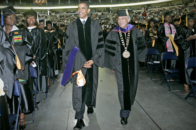 U.S. Sen. Barack Obama, D-Ill., left, and Norman C. Francis, president of Xavier University of Louisiana are seen during the processional at the annual commencement program for Xavier University of Louisiana in New Orleans on Saturday, Aug. 12, 2006. Obama, also received an honorary Doctor of Laws degree. (AP Photo/Judi Bottoni)