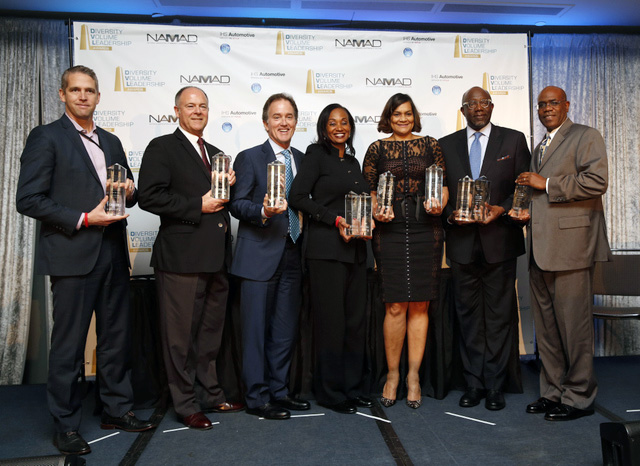 Toyota and Lexus team members hold the awards they won at the National Association of Minority Automobile Dealers and IHS Diversity Volume Leadership Awards at the Cobo Center in Detroit, Mich. on January 10, 2016. Left to right: Jeff Ball, Michael Rouse, Bill Fay, Alva Adams-Mason, Ayiko Broyard, Jim Colon and Glen Lee. (Jeff Kowalsky/TMS)