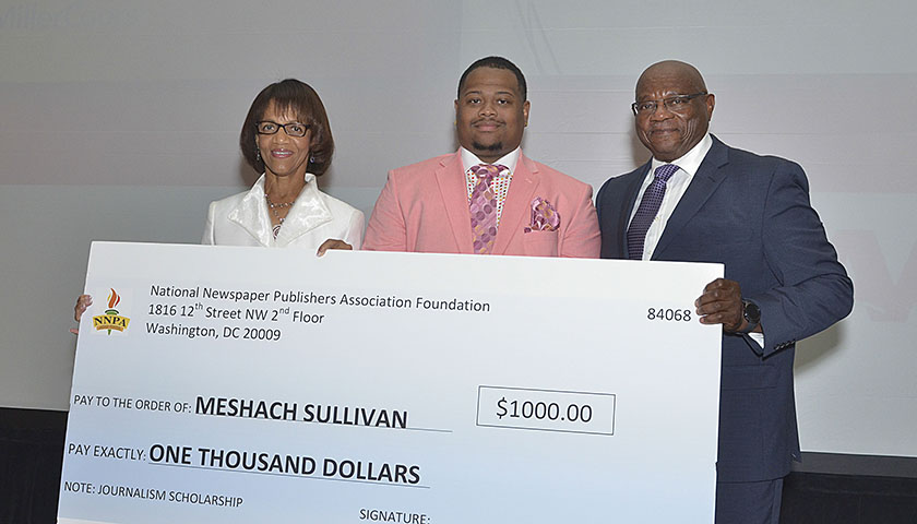 Meshach Sullivan (center), a student at Texas Southern University, received a $1,000 scholarship from the NNPA Foundation at the 2016 Merit Awards sponsored by Miller-Coors. Jackie Hampton (left), publisher of Mississippi Link and Al McFarlane, NNPA Foundation Chair joined Sullivan for the photo. (Freddie Allen/NNPA)