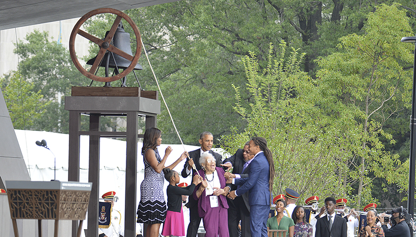 Members of the Bonner family join Firs Lady Michelle Obama (left) and President Barack Obama (3rd from the left) to ring the freedom bell from the First Baptist Church of Williamsburg, which was founded in 1776 and is one of the country's oldest Black churches. (Freddie Allen/AMG/NNPA)