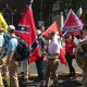Alt-right members preparing to enter Emancipation Park holding Nazi, Confederate, and Gadsden “Don’t Tread on Me” flags in Charlottesville, Va. (Anthony Crider/Wikimedia Commons)
