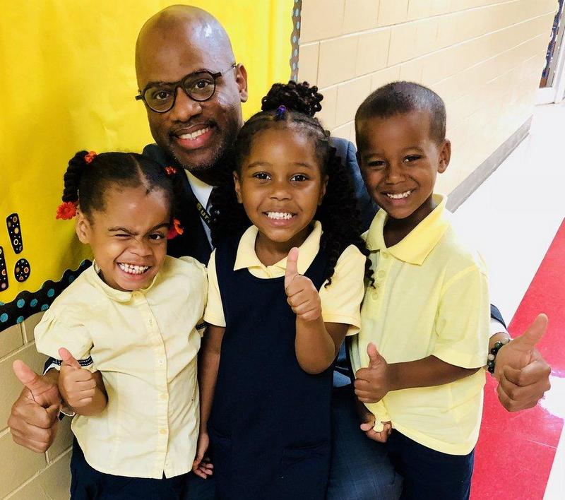 Principal LeVar Jenkins and kindergarten students and John Burroughs Elementary in Northeast, D.C. on the second.