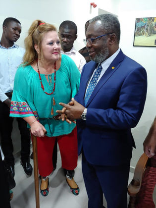 Gracie Rosenberger, left, co-founder of Standing With Hope, with Dr. Anthony Nsiah-Asare, Director General of Ghana Health Service.