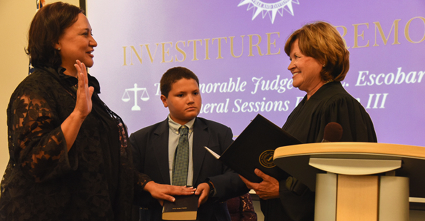 (l-r): Judge Ana L. Escobar, Judge Escobar’s son Conner Burchwell, and Justice Sharon G. Lee of the Tennessee Supreme Court.