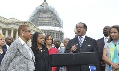 Congresswoman Eleanor Holmes Norton stands with NNPA President and CEO Dr. Benjamin F. Chavis Jr., and members of the Black and Hispanic press at a news conference on Capitol Hill in 2016/Washington Informer Photo