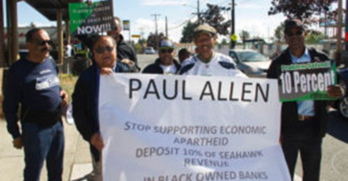 Activist in Seattle held a protest on Monday calling for the NFL and Seahawks owner Paul Allen to deposit 10 percent of all revenue and one-third of the moeny for players pensions into Black-owned banks.