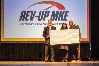 2018 Rev-Up MKE winner Susie Roberts holding her $10,000 check. (Picture provided by Rev-Up MKE)
