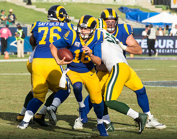 Quarterback Jared Goff (16) scored three touchdowns against the Green Bay Packers (Robert Torrence/L.A. Sentinel)