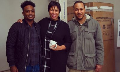 Mayor Muriel Bowser (center) enjoys a cup of coffee with Village Cafe co-founders Kevon King and Ryan Williams.