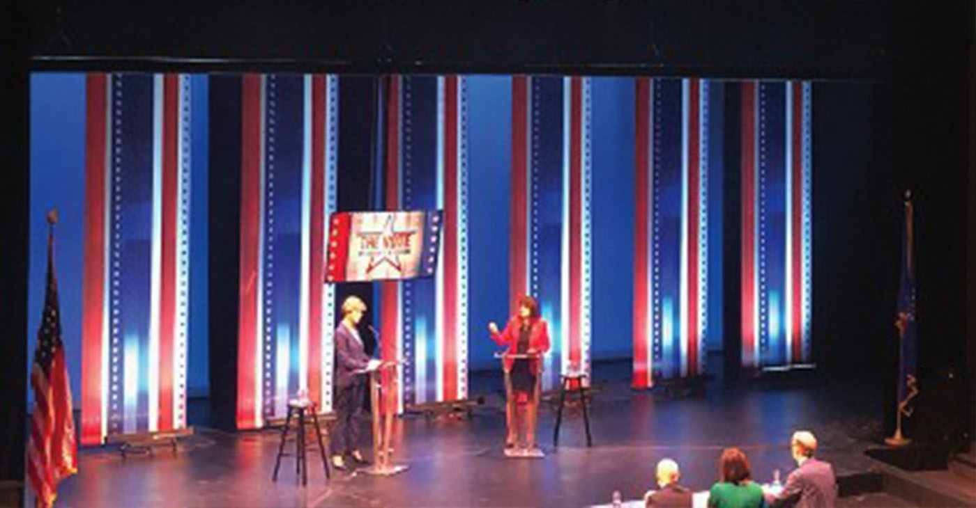 U.S. Senator Tammy Baldwin (right) and challenger Leah Vukmir (left) debate about a variety of issues. (Photo by Nyesha Stone)