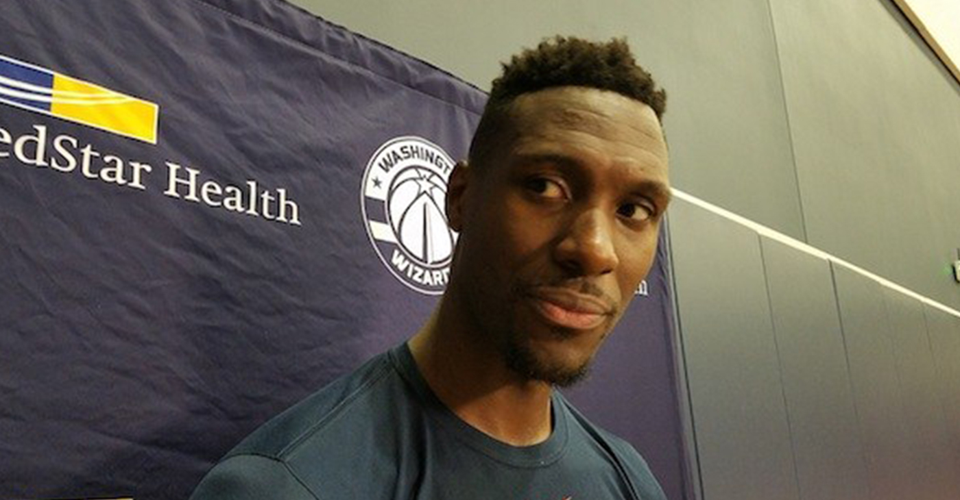 Washington Wizards center Ian Mahinmi speaks with reporters after practice at Entertainment and Sports Arena in southeast D.C. on Oct. 19. (William J. Ford/The Washington Informer)
