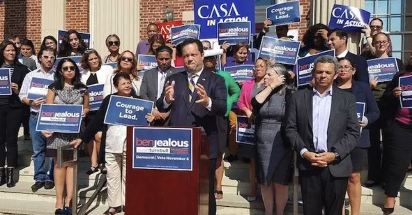 Maryland Democratic gubernatorial candidate Ben Jealous (at podium) stands with Latino leaders and other supporters outside CASA de Maryland's Multicultural Center in Langley Park during an Oct. 1 campaign rally. (William J. Ford/The Washington Informer)