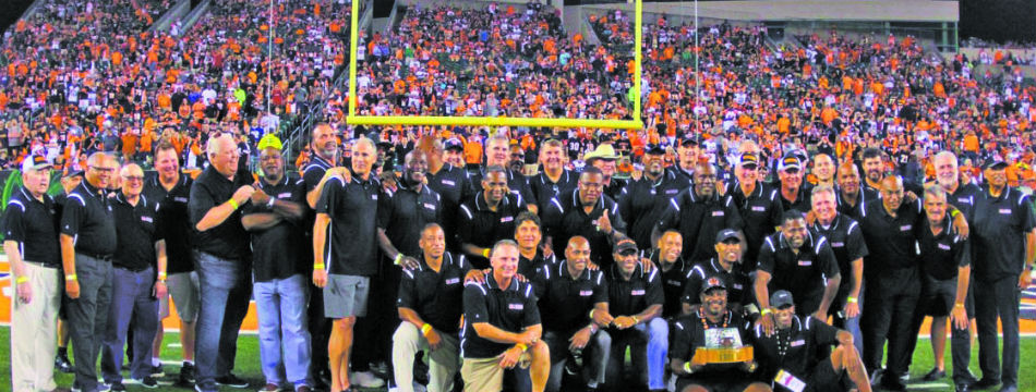 Former members of the Cincinnati Bengals 1988 Super Bowl team were recognized at the first home game this season. Quarterback Boomer Esiason and Coach Sam Wyche were unable to attend. Photo by Michael Mitchell