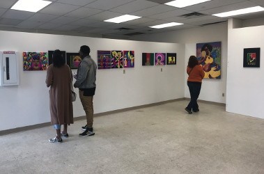 Guests at the Spirit of Wakanda Festival tour the Visual Arts Gallery (Photo by Rhea Riley)