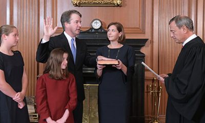 Chief Justice John G. Roberts, Jr., administers the Constitutional Oath to Judge Brett M. Kavanaugh in the Justices’ Conference Room, Supreme Court Building. Mrs. Ashley Kavanaugh holds the Bible. Credit: Fred Schilling, Collection of the Supreme Court of the United States.