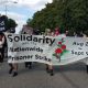 Marchers occupy Michigan Avenue in Lansing, Mich., on Aug. 23 in solidarity with the National Prison Strike.