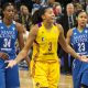 Candace Parker of the Los Angeles Sparks surrounded by the Minnesota Lynx