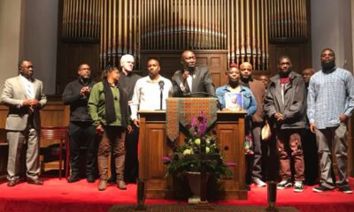 During prayer vigil, noted civil rights attorney Benjamin Crump Jr. (at podium) with area leaders and family members of 21-year-old Emantic Fitzgerald “E.J.” Bradford Jr. who was killed Thanksgiving night by a Hoover police officer inside the Riverchase Galleria. (Erica Wright Photo, For The Birmingham Times)
