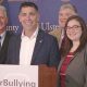 Activist Jeff Rindler and Ulster County Executive Michael Hein (2nd & 3rd from left) in solidarity with the awareness campaign pose for a photo as they announced a social media campaign, #EndCyberBullying.