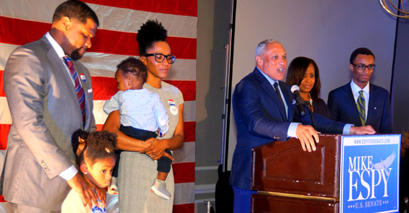 Espy, with family standing with him, addresses supporters on election night at the Hilton Jackson, County Line Road, Jackson, MS