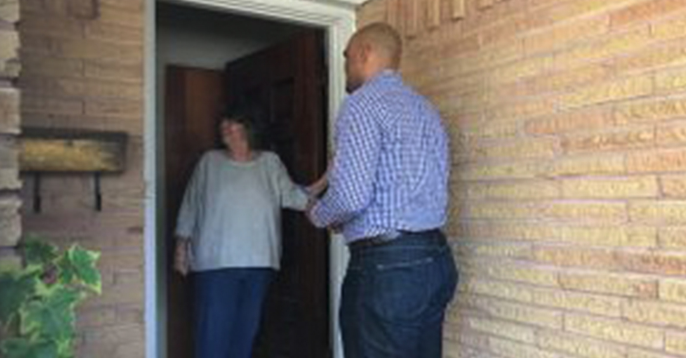 Colin Allred surprises a voter on Friday afternoon while canvassing neighborhoods to explain why he deserves their vote.