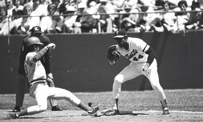 Willie McCovey attempts to tag Cincinnati Reds' shortstop Dave Concepcion out at first base (Photo: Sheldon Dunn/Wikimedia Commons)