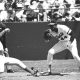 Willie McCovey attempts to tag Cincinnati Reds' shortstop Dave Concepcion out at first base (Photo: Sheldon Dunn/Wikimedia Commons)