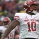 Houston defensive tackle Ed Oliver (10) celebrates after making a stop during the first half of an NCAA college football game against South Florida Saturday, Oct. 28, 2017, in Tampa, Fla. (Photo by Phelan M. Ebenhack)