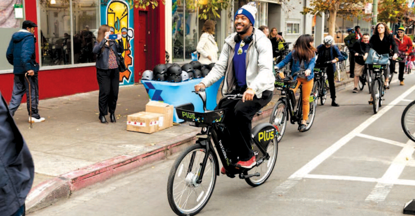 Bike enthusiast try out the Ford ebike at the launch in Oakland Dec. 14. Photo by Ford GoBike.