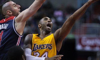 Kobe Bryant of the Los Angeles Lakers shooting against former Washington Wizards player Marcin Gortat (Wiki media commons)