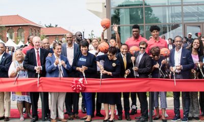D.C. Mayor Muriel Bowser, Council members Jack Evans (D-Ward 2), Anita Bonds (D-At Large), Kenyan McDuffie (D-Ward 5), Brandon Todd (D-Ward 4) and Trayon White (D-Ward 8), Ed Fisher, executive director of St. Elizabeths East Campus, and Greg O’Dell, president and CEO of EventsDC, along with other officials and Ward 8 residents, cut the ribbon for the new Sports and Entertainment Arena in Southeast on Sept 22. (Shevry Lassiter/The Washington Informer)