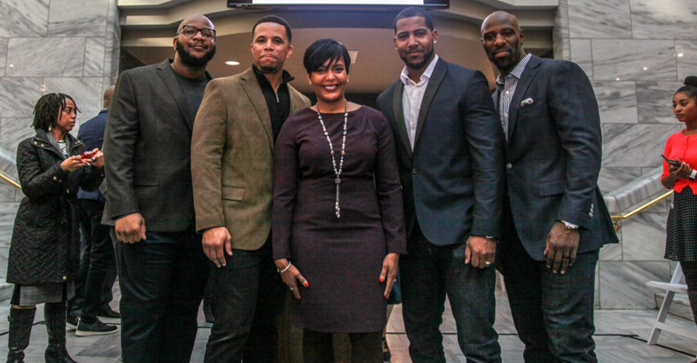 Mayor Keisha Lance Bottoms (Center) with reps from NFL officials, Boys & Girls Club of America, and Radio One. (Photo by: Que Fullwood)