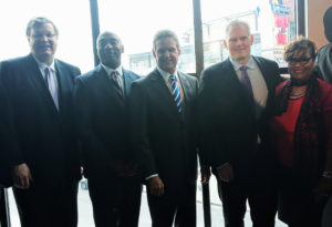From left, Memphis Mayor Jim Strickland, Shelby County Mayor Lee Harris, Gov. Bill Lee, FedEx Logistics CEO Richard Smith and Beverly Robertson, Greater Memphis Chamber president and CEO pose for photos during the announcement that FedEx Logistics is relocating to the Gibson Guitar Building.