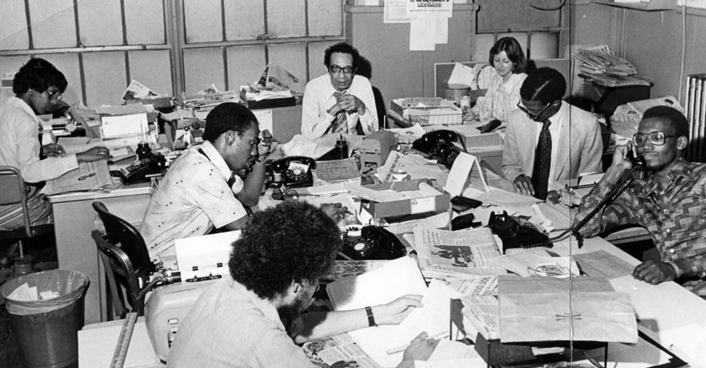 Employees working in an office at the headquarters of the Afro American Newspapers in Baltimore, Maryland, 1975. (Photo by Afro American Newspapers)